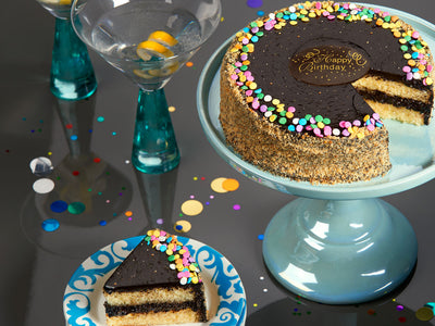 Celebrate your loved ones in style with yummy yellow cake and rich fudge frosting with rainbow candies!


