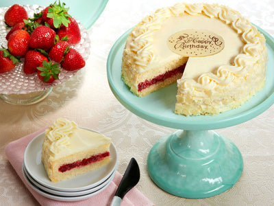 Yummy yellow cake with delicious strawberry filling and creamy mousse frosting!

